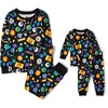 The Children’s Place Baby and Kids’ Sibling Matching Halloween and Holiday Pajama Sets, Cotton(Candy Glow)